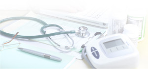 Sethoscope and eqiupment on table, filtered, green